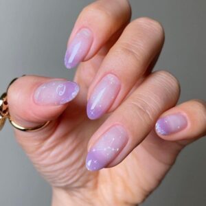 Explore over 45 mesmerizing designs with a stunning twist on purple gradient nails!