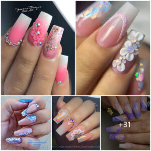 Close-up of short nails adorned with elegant floral designs.